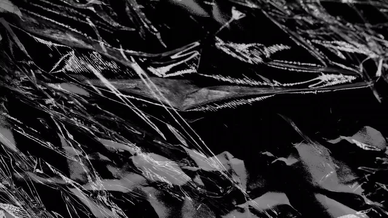 animación de líneas blancas rasgadas sobre una textura en movimiento con fondo negro arrugado