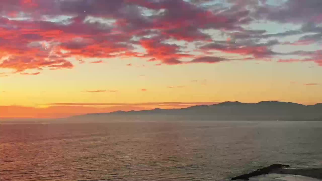 Cityscape at Sunrise/Sunset with Traffic on Highway