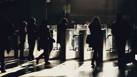 People-passing-through-the-ticket-gates-in-metro