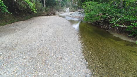 gimbal walk forward over bed of dajabon river, dominican republic