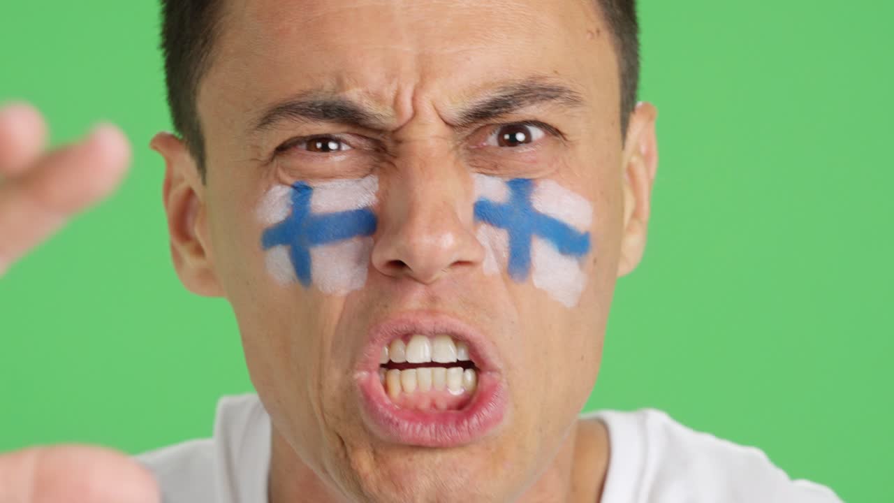 Man with finnish national flag upset with a referee