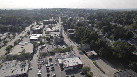 Rotating-high-over-Marlborough,-Massachusetts-city-center