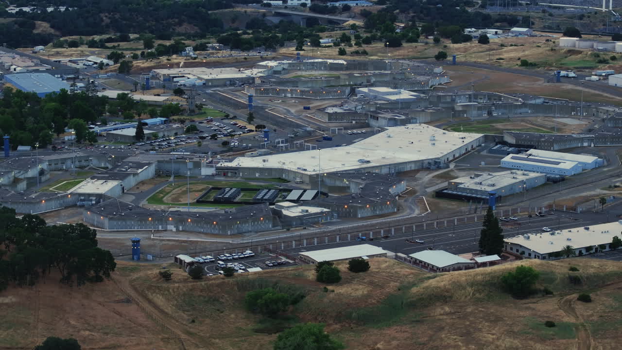 Aerial Drone View of Folsom Prison during sunset. Push in Parallax - 4K