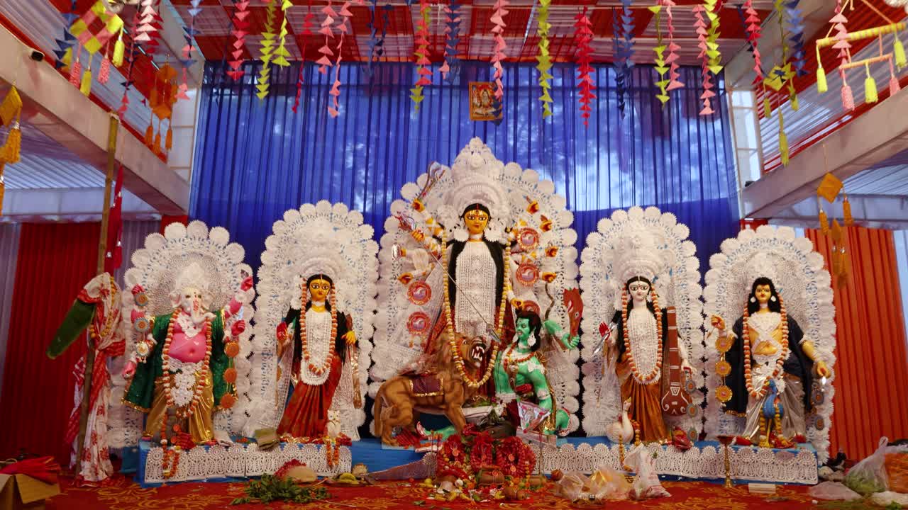 durga puja festival with ornate idol display in temporary shed