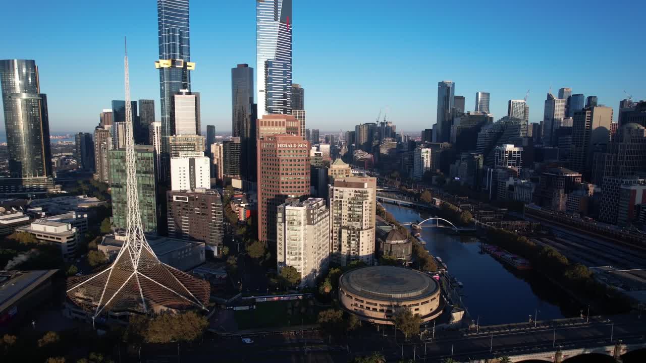 Melbourne skyline, arts center on the yarra river, skyscrapers with blue sky