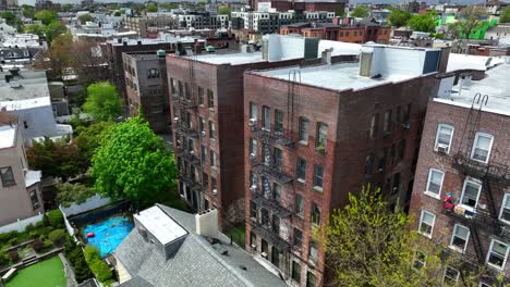 red brick apartment building in nyc with fire escape stairs for emergencies