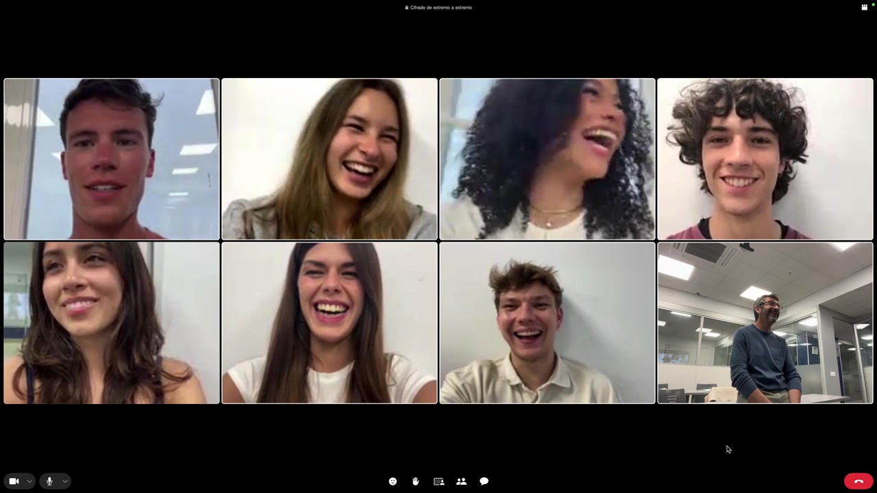 Diverse Group of People Smiling and Laughing on a Video Call