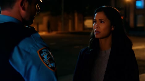 police officer and woman in conversation