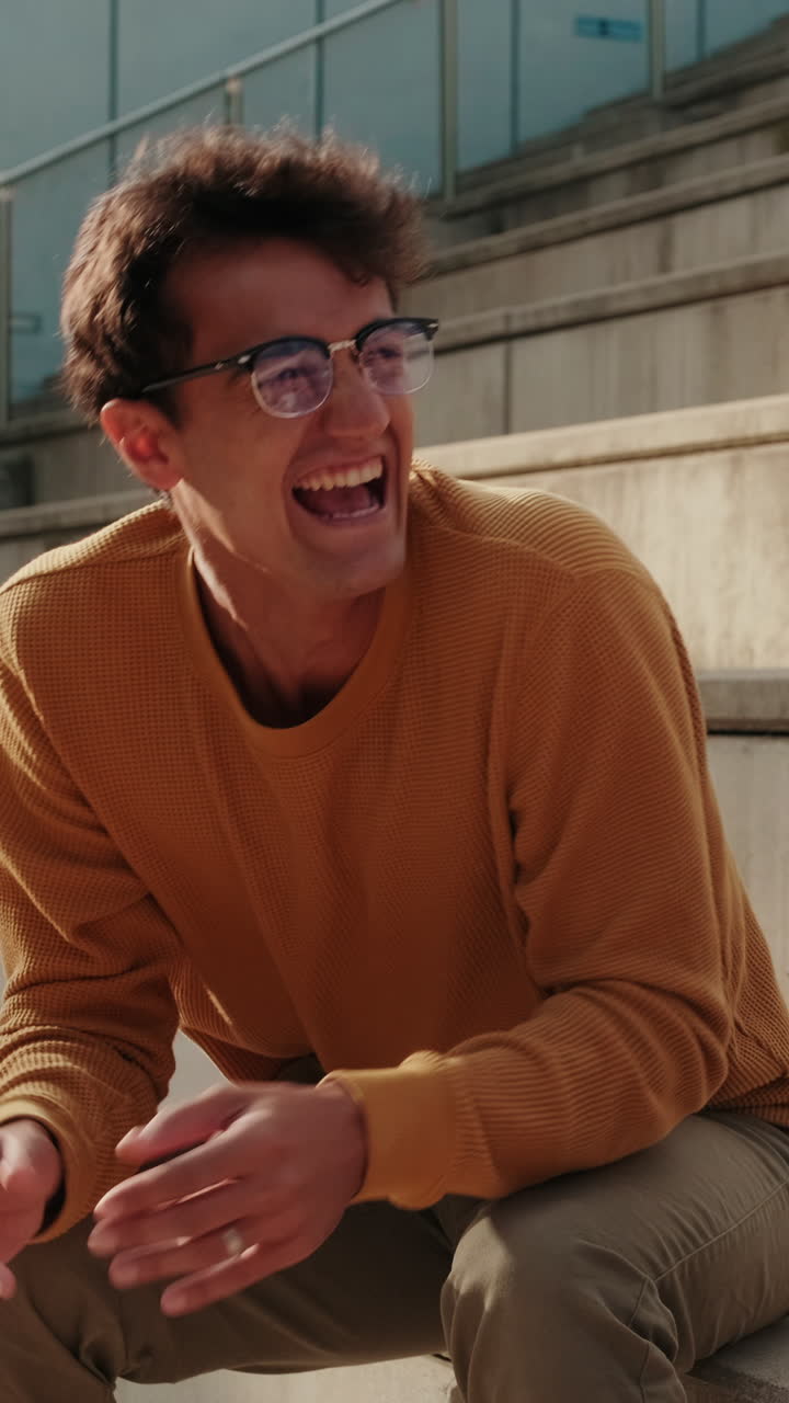 A cheerful young student tells stories to his friends