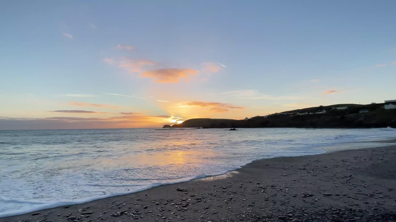 Beautiful sunset wide angle, sandy beach in Ireland during winter