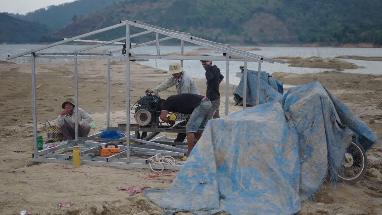 Construction of a small house by the lake
