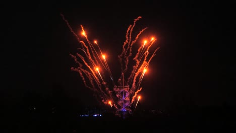 red fireworks from tower, slow motion