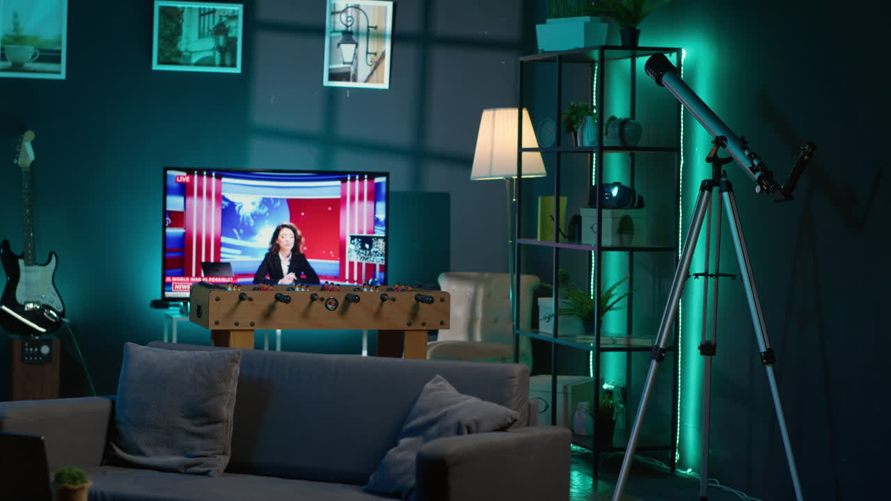 Empty stylish studio apartment with cool trendy decorations and equipment for a young man, minimalist space decorated with led neon lights. Cozy urban loft with a home theatre setup.