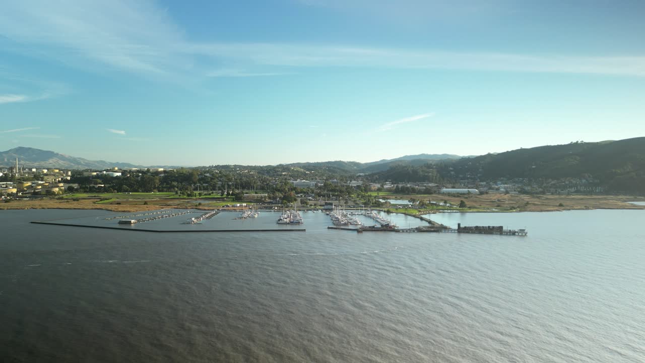 Aerial perspective of wetlands along Carquinez Strait Regional Shoreline and harbor in Martinez, California