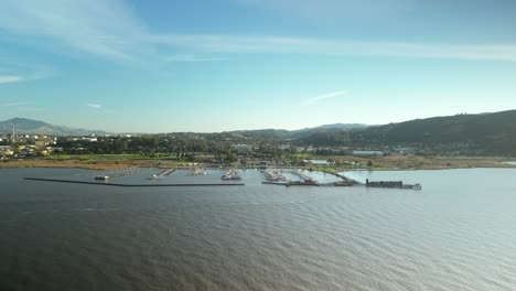aerial perspective of wetlands along carquinez strait regional shoreline and harbor in martinez, california