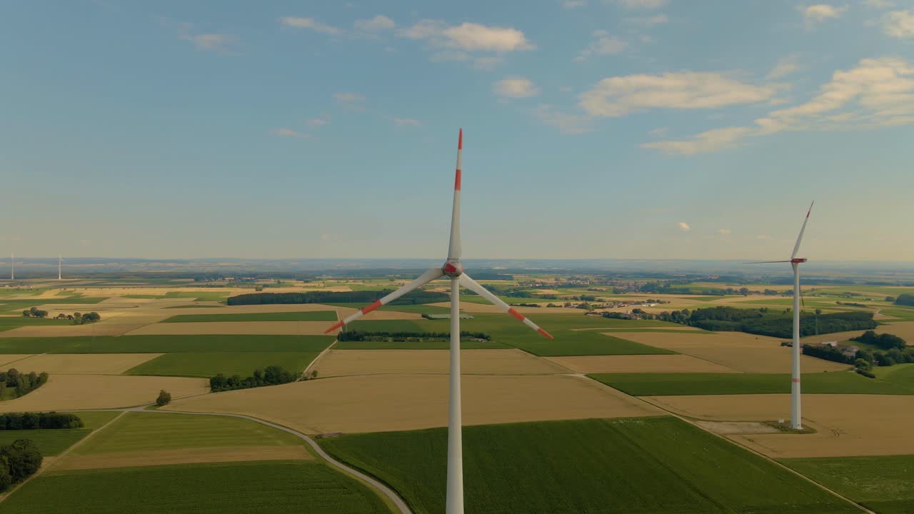 Circle around windmill with drone.