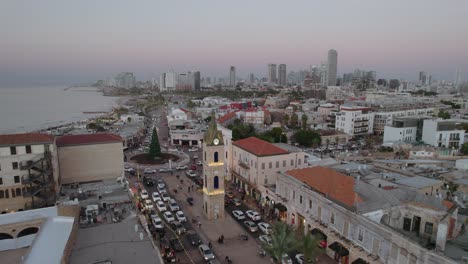 Vista-De-Paralaje-De-La-Torre-Del-Reloj-De-Jaffa-Y-El-árbol-De-Navidad---El-Horizonte-De-Tel-Aviv-En-El-Fondo-#005