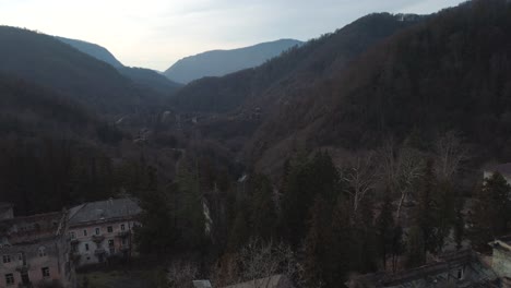 aerial view of abandoned town in a mountain valley