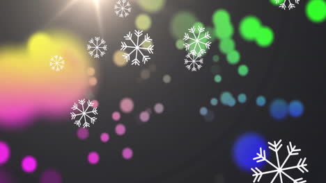 animation of colourful spots over snow falling