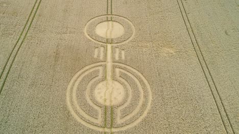 Sydmonton-rural-wheat-field-countryside-farmland-crop-circles-art-aerial-rising-tilt-down-view