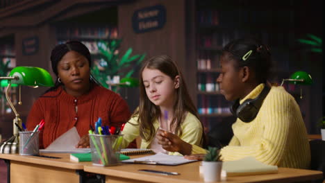 students collaborating in a library classroom