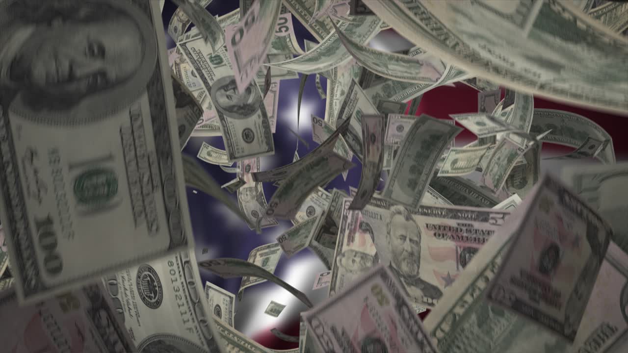 dinero cayendo en la bandera estadounidense
