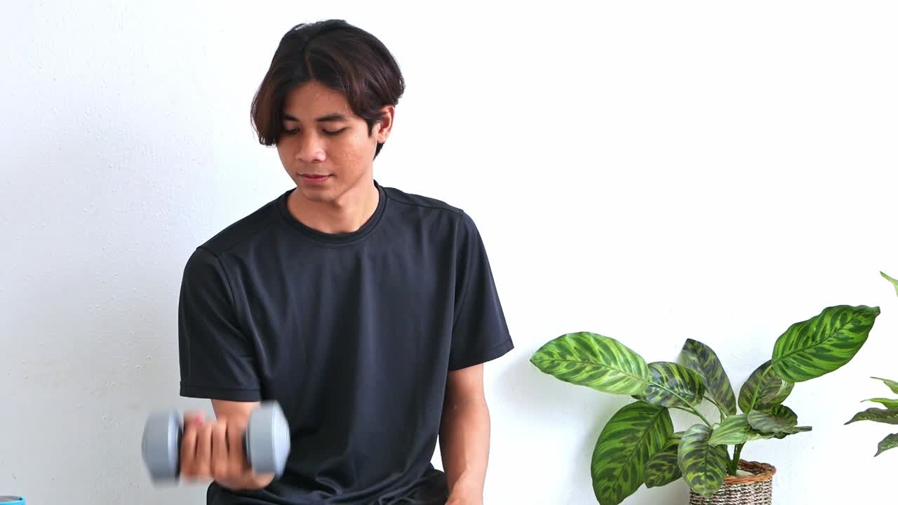 Man lifting dumbbells for exercise