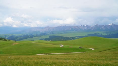 grassland and mountains in a sunny day, in kalajun grassland, xinjiang, china.