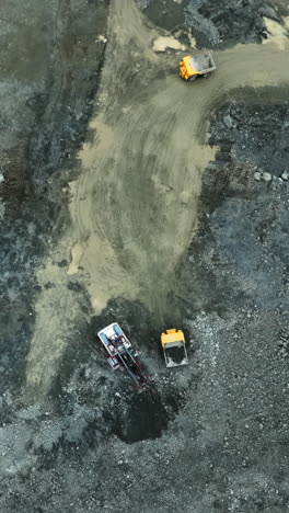 aerial view of heavy machinery at a mining or construction site