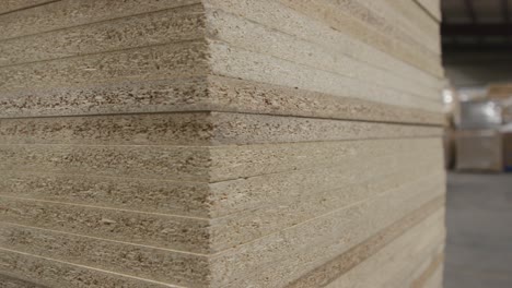 wood squares stacked inside a factory