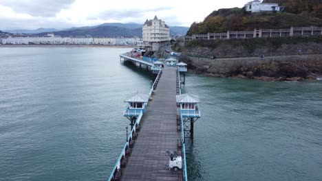 llandudno pier historic victorian wooden boardwalk seaside landmark aerial view travelling low overhead