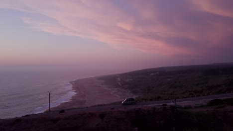 coastal sunset view with wind turbines