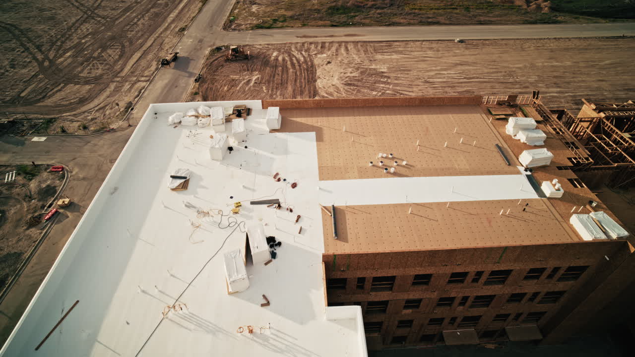 Aerial View of a Construction Site with Building Under Construction