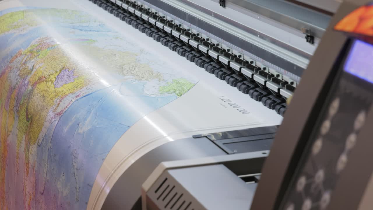 Modern Digital Large format UV printer. Printing production technologies. UV pinning is the process of applying a dose of low intensity ultraviolet light to a UV curable ink