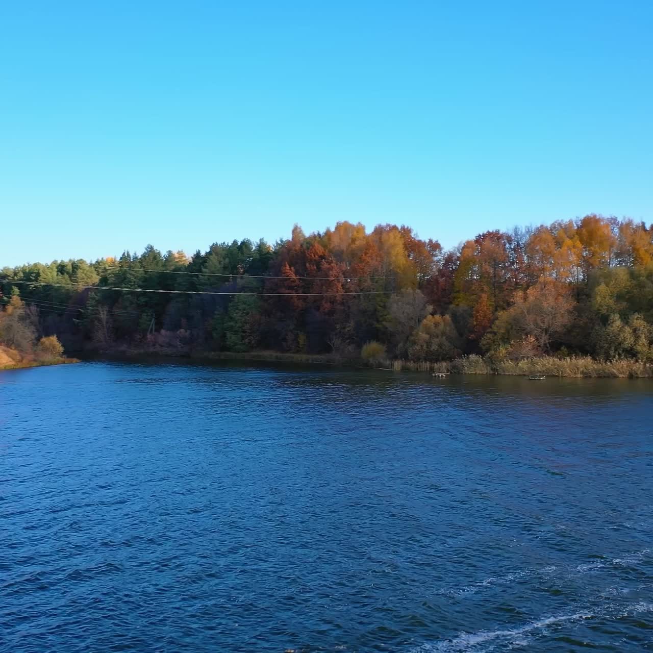 Autumn forest and river from air