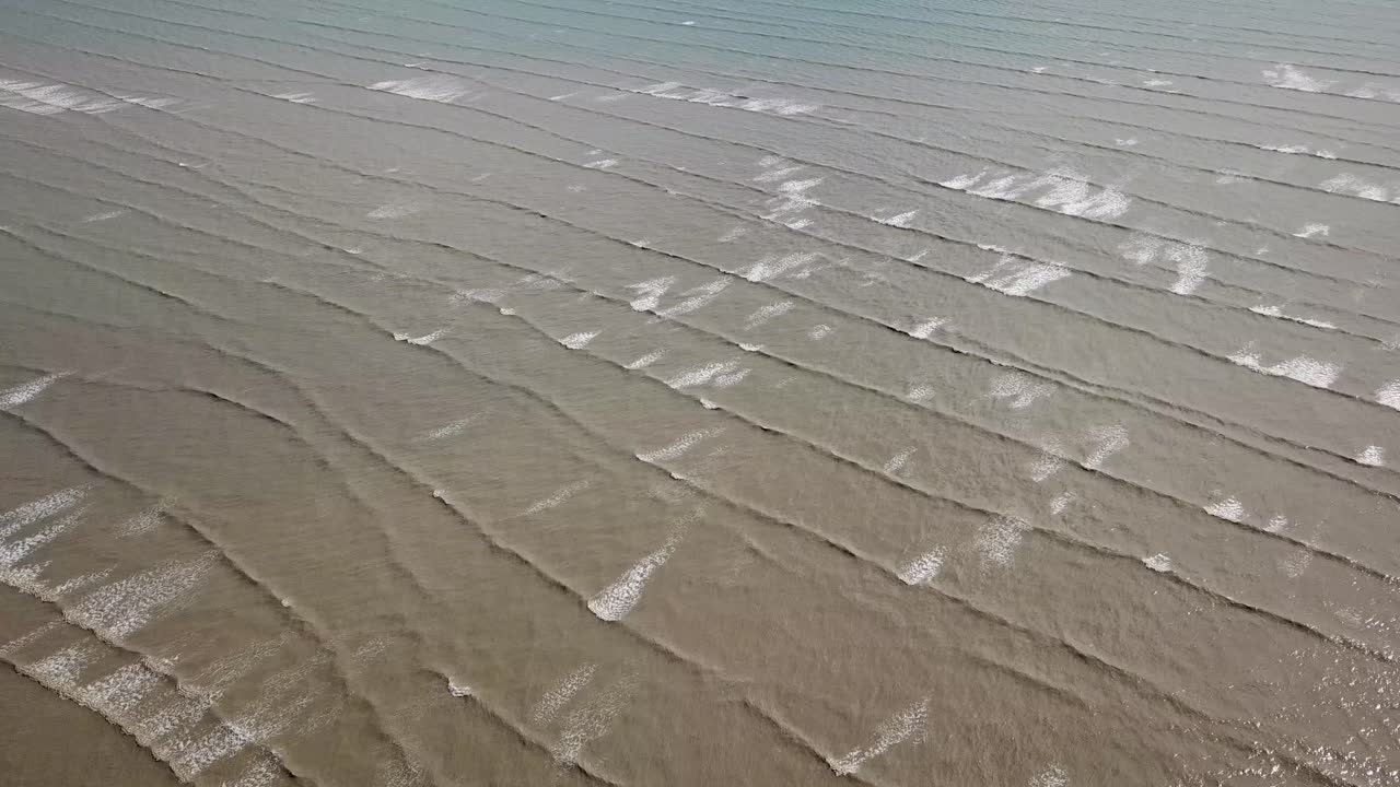 쿠알라 무다, 페에서 공중에서 볼 수 있는 갈색 파동.