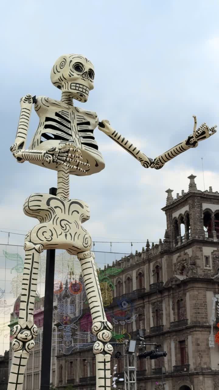 Skeleton Sculpture at Day of the Dead Display on Zócalo square, vertical shot