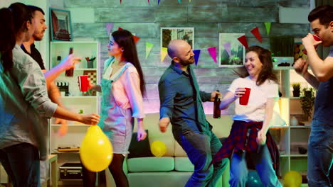 bald attractive young man smiling while dancing