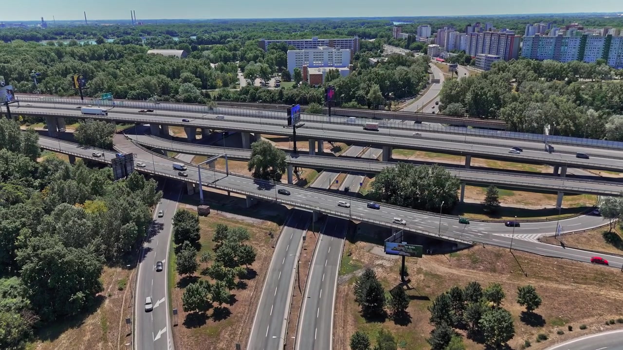 Traffic flows on highways in Bratislava, Slovakia during a sunny day