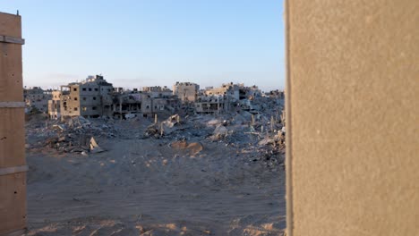 establishing shot of ruined palestinian city bombed destroyed buildings