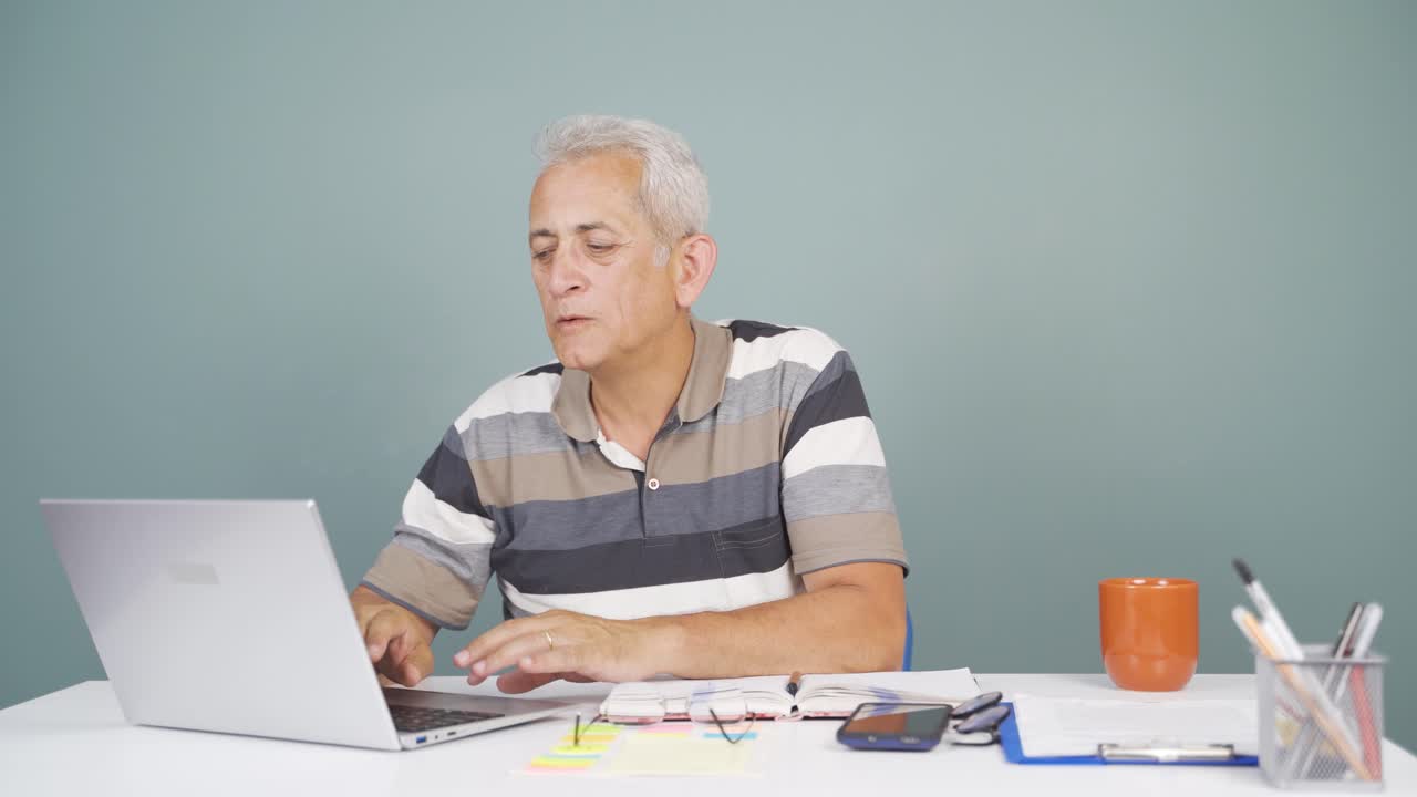 A man with a hearing problem.