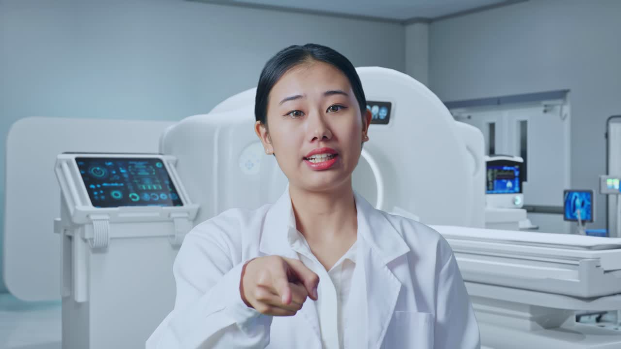 Close Up Of Asian Woman Doctor Shouting To Camera While Standing With Mri Machine In The Hospital