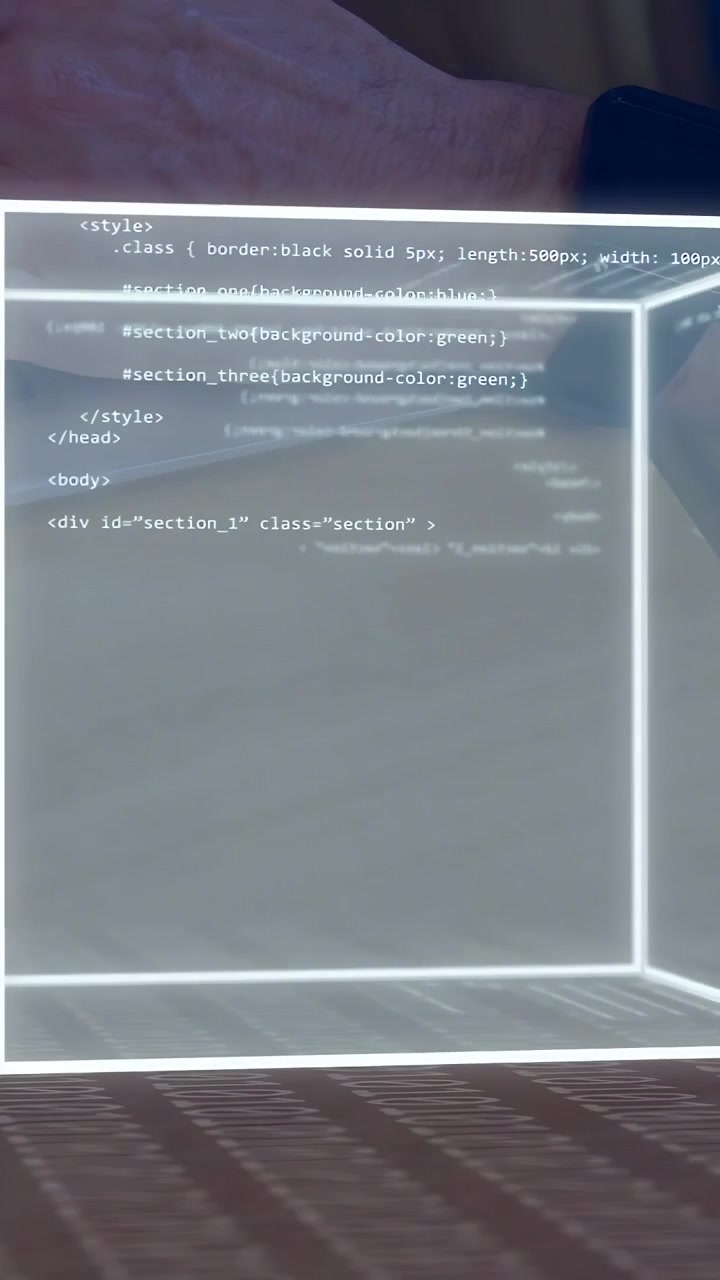 Vertical video: Glowing cube appearing after key tap, filling with code, rotating to show live code