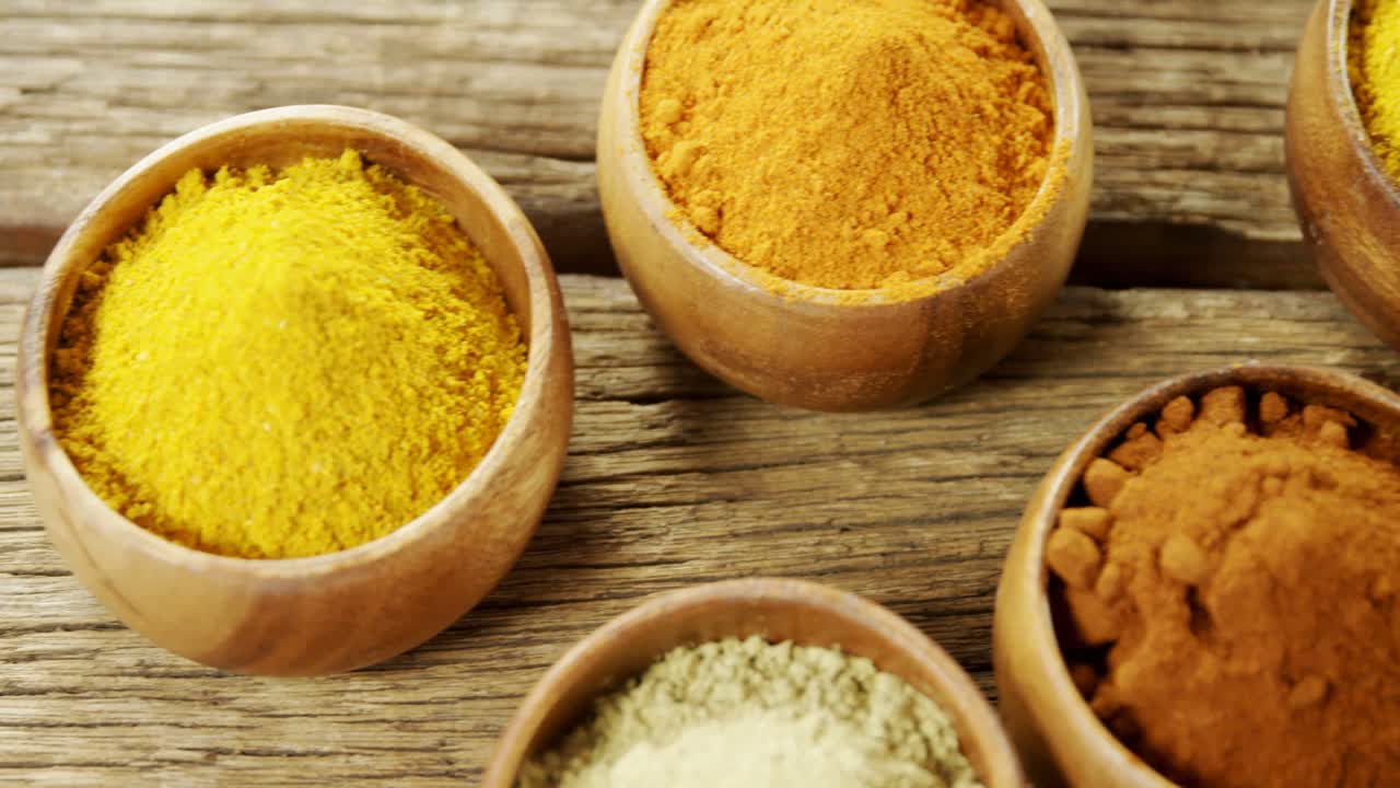 Various type spices in bowl 4k