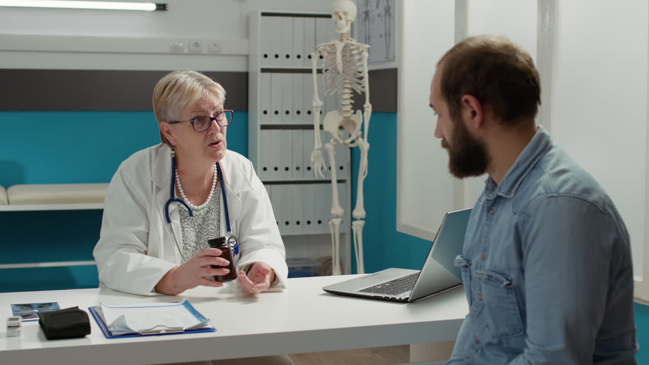 General practitioner giving bottle of pills to cure man with sickness