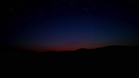 Sunset-over-hills-with-starry-sky