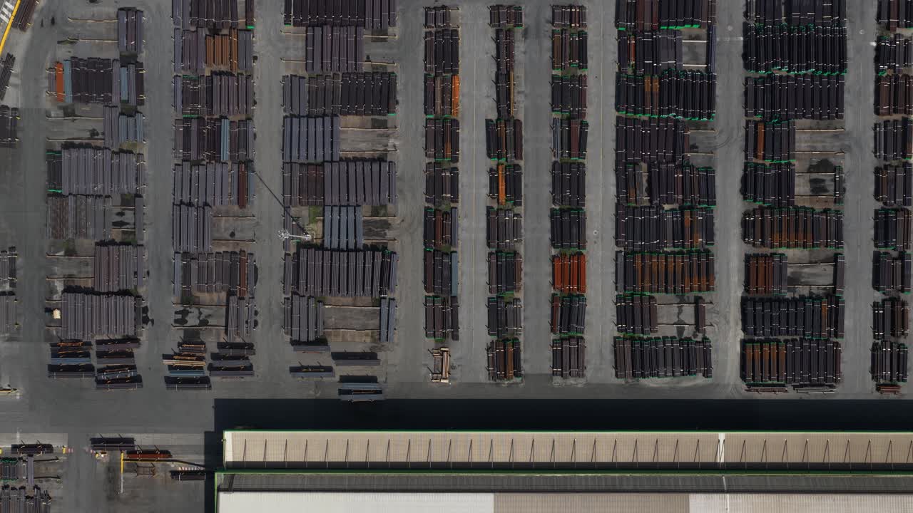 Industrial pipes manufacturing in Dalmine, Italy. Aerial drone video of factory grounds