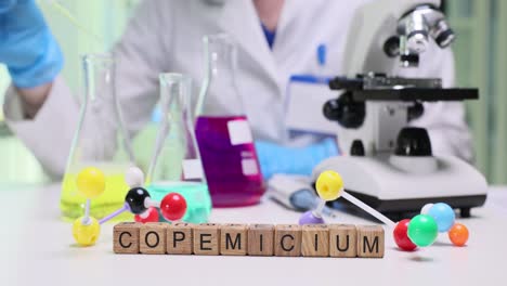 laboratory experiment with chemical models and microscope