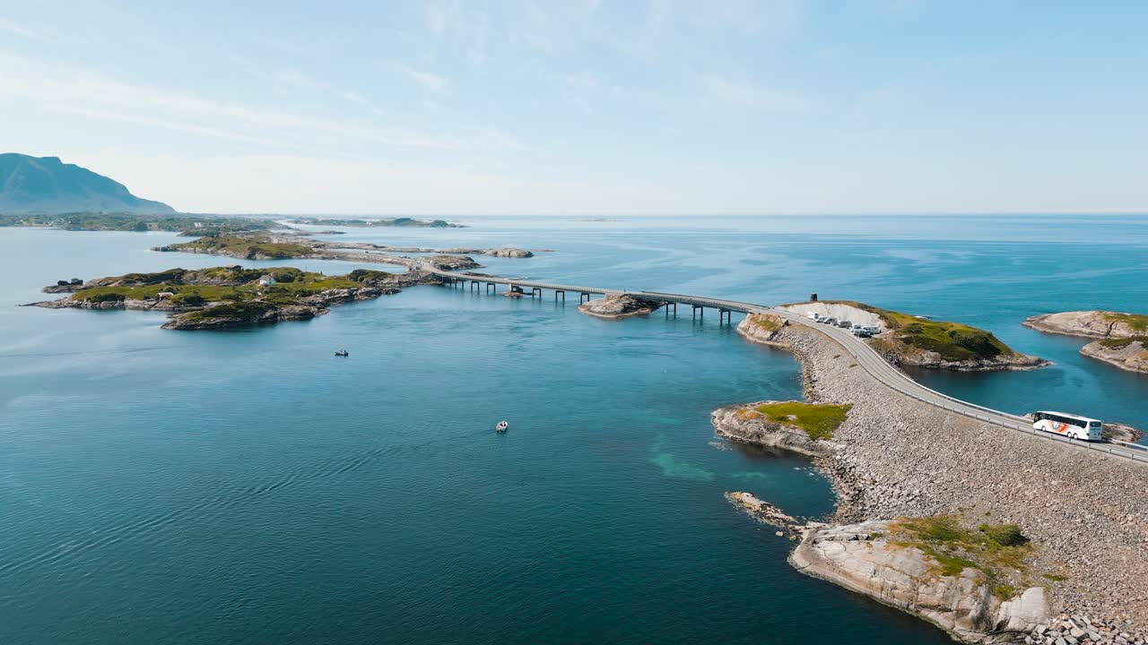 Aerial view of a buss on Atlantic Road also known as &rdquo;The Road in the Ocean&rdquo; in Norway