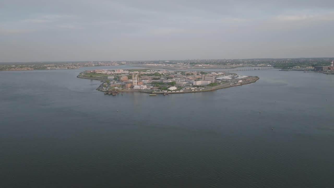 Aerial view of Rikers Island. Shot at sunset during the springtime in New York City.